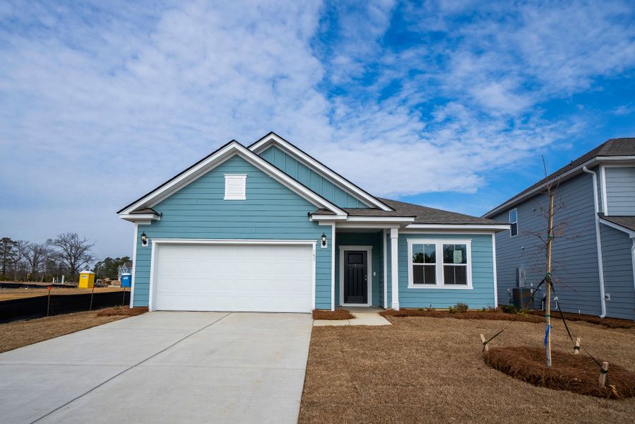 Front exterior of a new home in Monroe Preserve, Chapin, SC, highlighting curb appeal (Image 24).