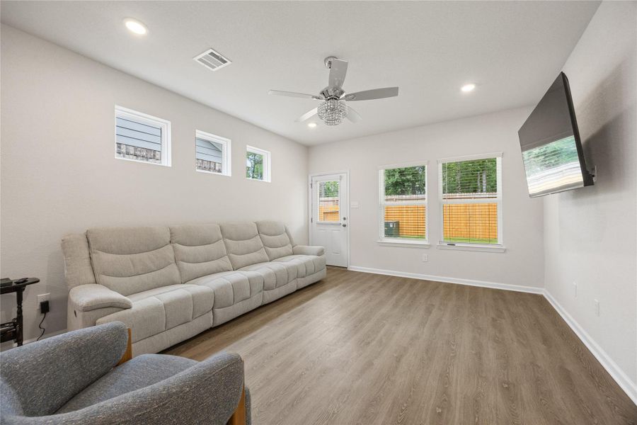 Furnished interior view inside a new home in Mill Creek Trails, Magnolia (Image 6).
