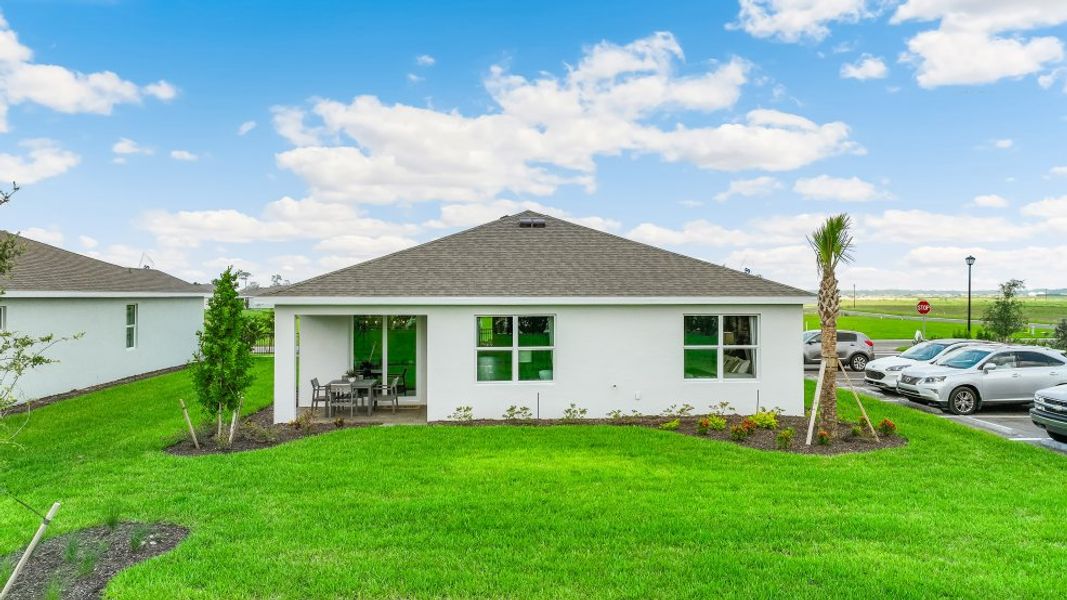 Representative exterior photo of a completed home built from the CALI by D.R. Horton in Palmetto Landing at Babcock Ranch Express, Punta Gorda, FL (Image 13).