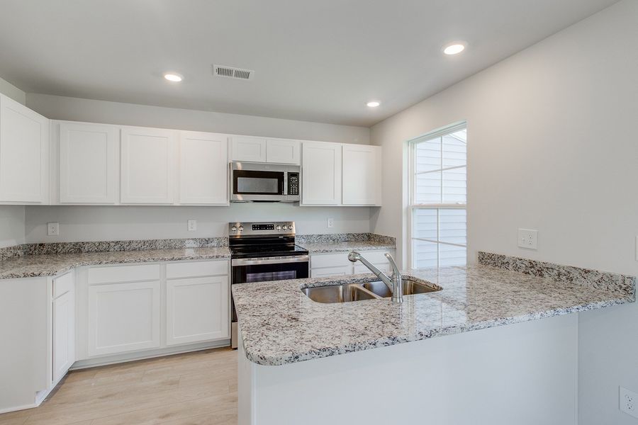 Furnished interior view inside a new home in Padgett Commons, Hopkins (Image 7).