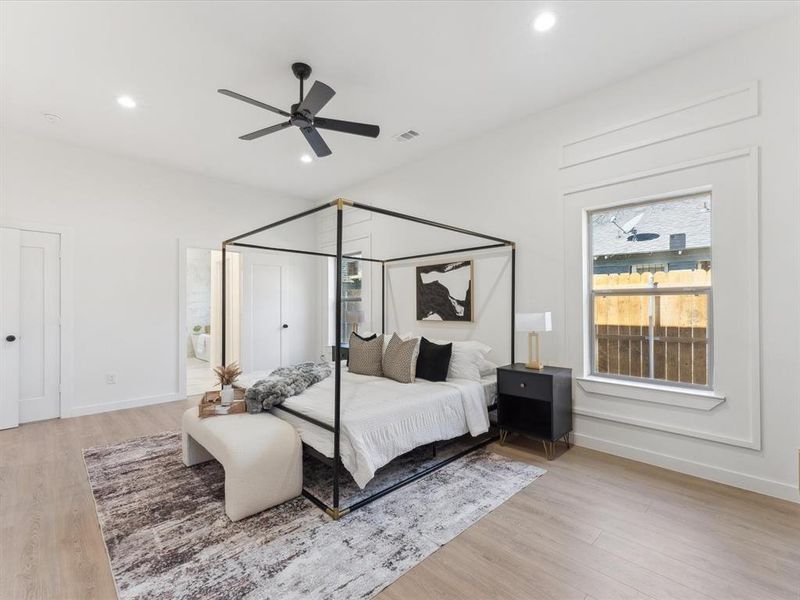 Bedroom with recessed lighting, baseboards, visible vents, and light wood finished floors