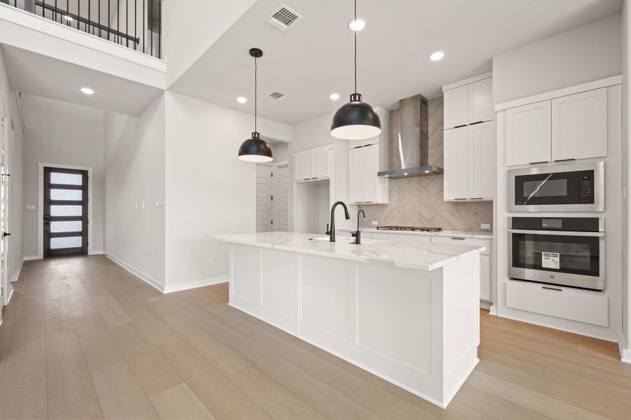 Furnished interior view inside a new home in Wolf Ranch, Georgetown (Image 14).