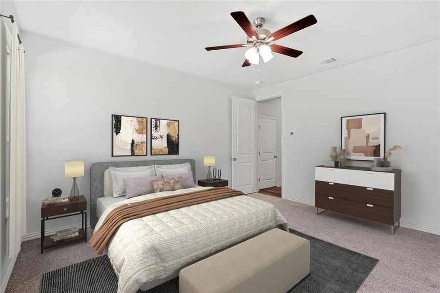 Carpeted bedroom featuring ceiling fan