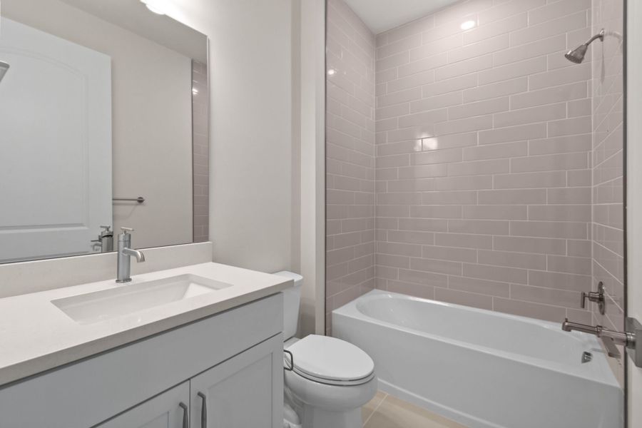 Furnished interior view inside a new home in Del Webb Tradition, Port St. Lucie (Image 9).