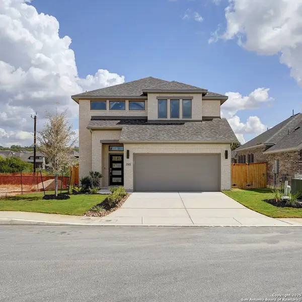 Front exterior of a new home in Ladera 40', San Antonio, TX, highlighting curb appeal (Image 2).