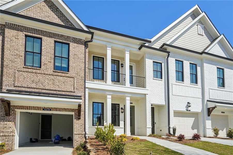 Front exterior of a new home in , Peachtree Corners, GA, highlighting curb appeal (Image 18).