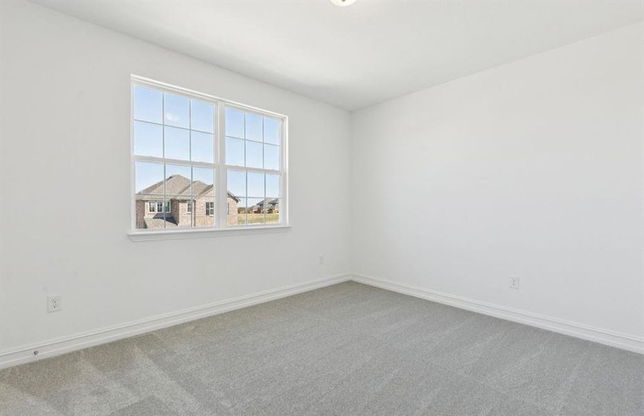 Bedroom with large windows