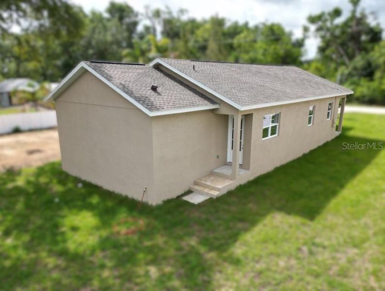Front exterior of a new home in , Dade City, FL, highlighting curb appeal (Image 17).
