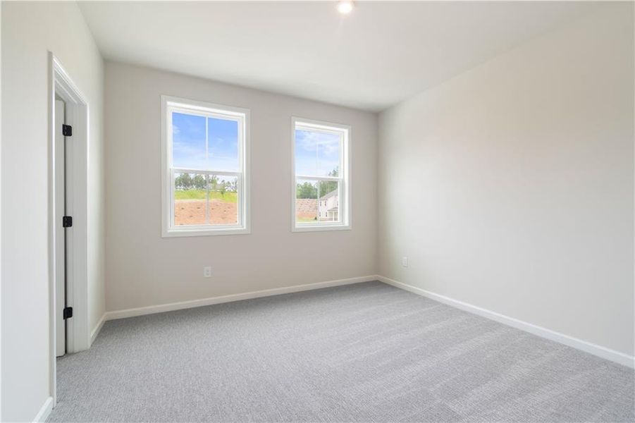 Spacious, unfurnished interior of a new home in Tiberon Woods, Cumming (Image 32).