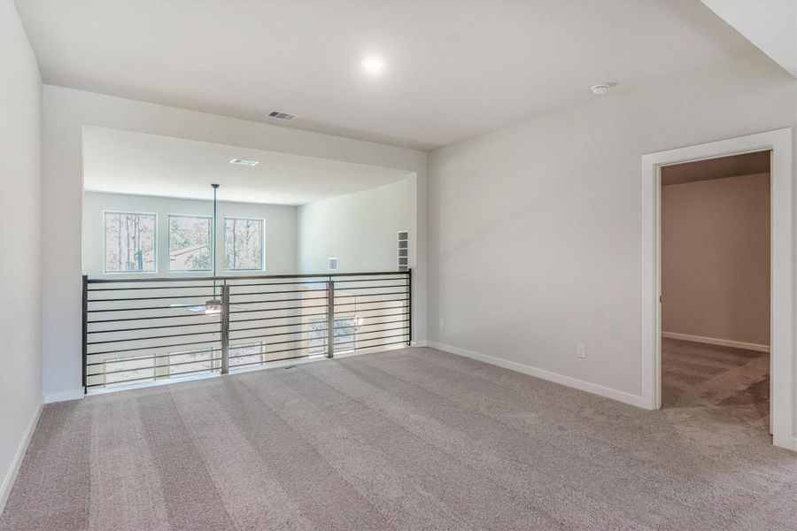 Spacious, unfurnished interior of a new home in Deer Pines, Conroe (Image 42).