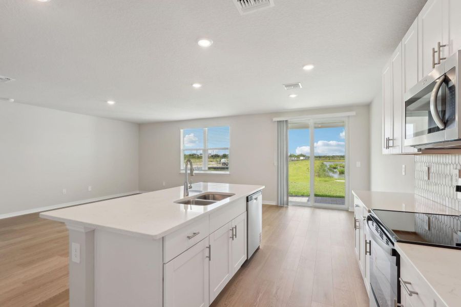 Furnished interior view inside a new home in Hampton Park - Classic Series, Vero Beach (Image 14).