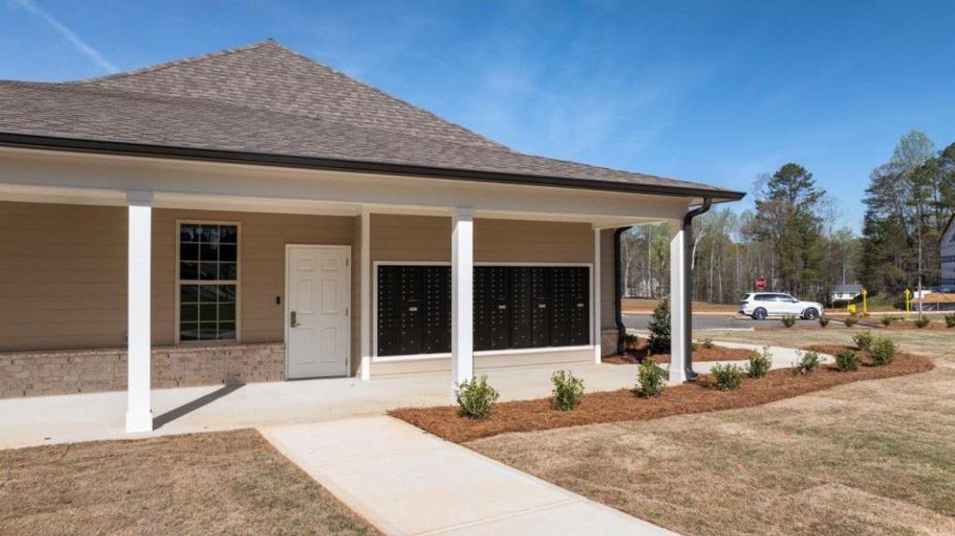 Front exterior of a new home in Fairhaven, Lithia Springs, GA, highlighting curb appeal (Image 31). Front exterior of a new home in Fairhaven, Lithia Springs, GA, highlighting curb appeal (Image 31).