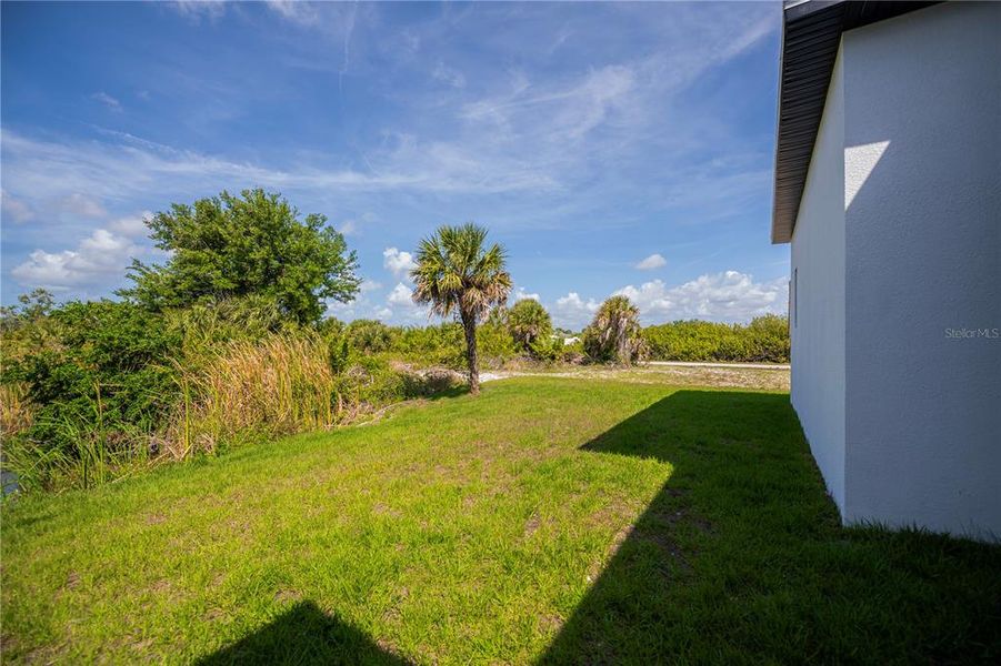 Exterior details and patio area of a home in , Port Charlotte (Image 37).