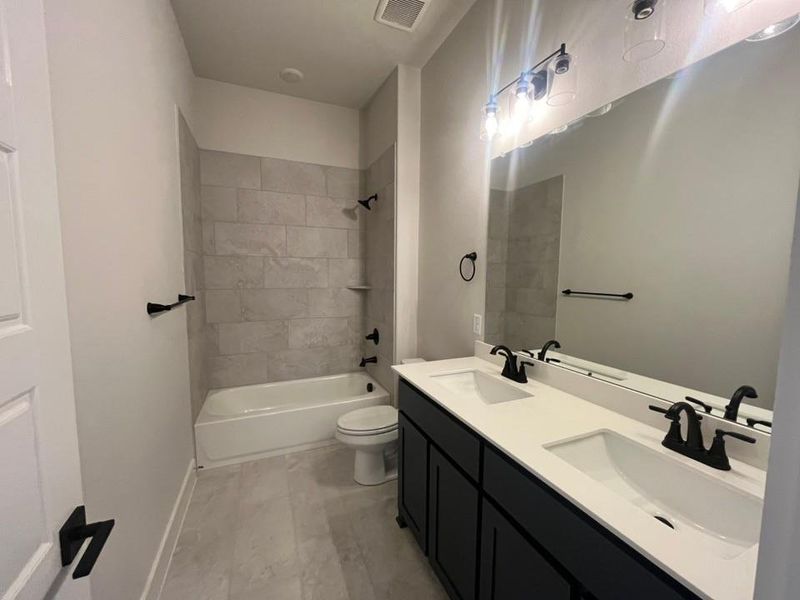 Furnished interior view inside a new home in Eagle Ridge Estates, Weatherford (Image 10).