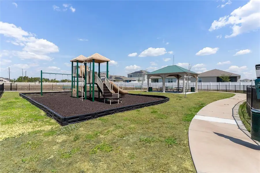 Front exterior of a new home in Sol Vista, Dundee, FL, highlighting curb appeal (Image 1).