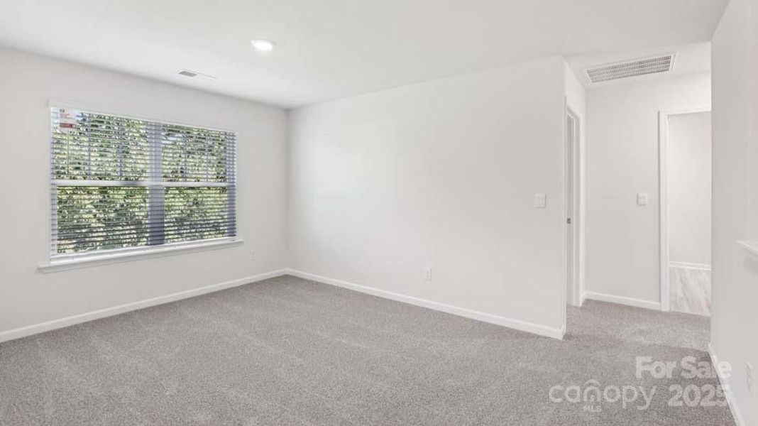 Spacious, unfurnished interior of a new home in Wallace Springs, Statesville (Image 34).