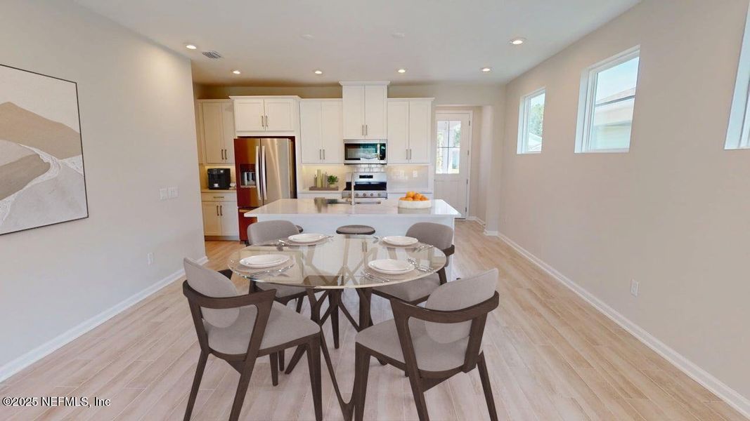 Furnished interior view inside a new home in RiverTown - WaterSong, St. Johns (Image 9).
