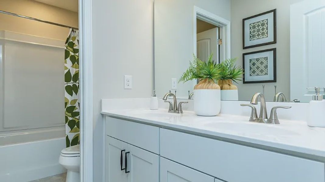 Furnished interior view inside a new home in Sidney Creek Single Family, Zebulon (Image 25).