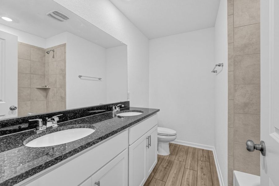 Furnished interior view inside a new home in Sunfield, Buda (Image 9).