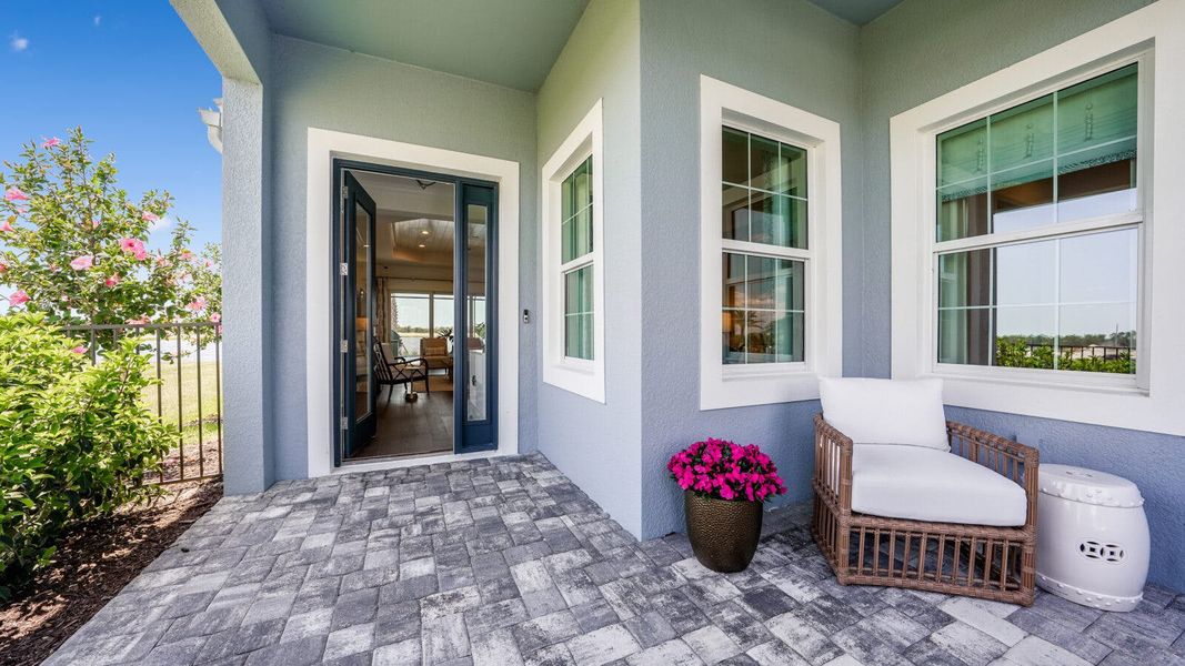 Exterior details and patio area of a home in SkySail Real Estate and Homes for Sale in Naples, FL - Neal Communities, Naples (Image 3). Exterior details and patio area of a home in SkySail Real Estate and Homes for Sale in Naples, FL - Neal Communities, Naples (Image 3).