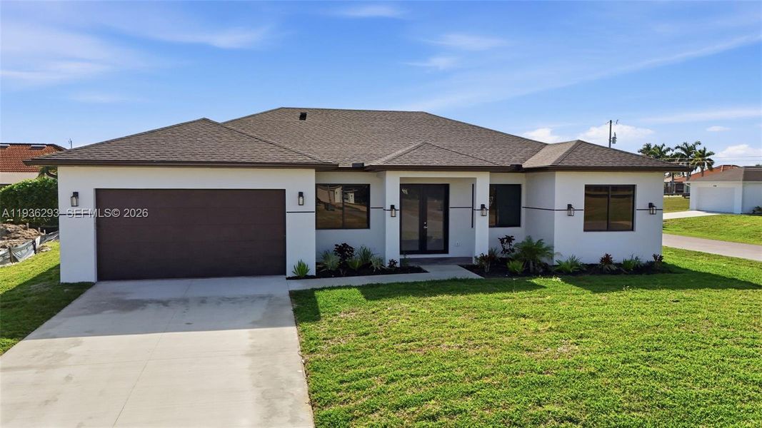 Front exterior of a new home in , Cape Coral, FL, highlighting curb appeal (Image 31).