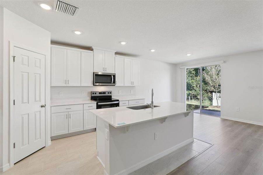 Furnished interior view inside a new home in Bradbury Creek - Signature Series, Haines City (Image 17).