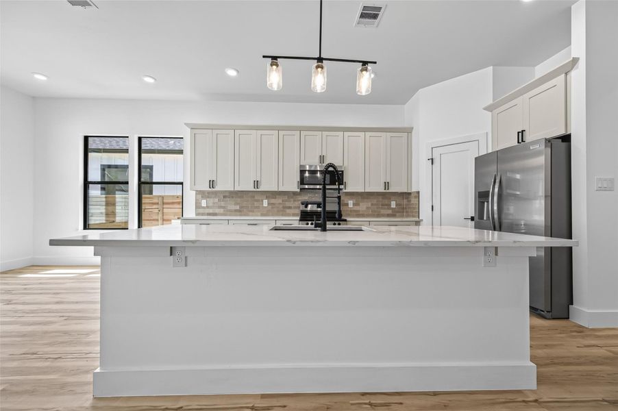 Furnished interior view inside a new home in , Conroe (Image 7).