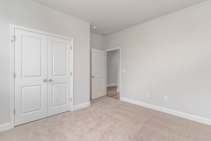 Representative unfurnished interior of a home built from the DARBY by D.R. Horton in Brunswick Plantation, Calabash (Image 6).