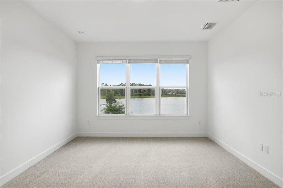 Spacious, unfurnished interior of a new home in Esplanade at Westview, Kissimmee (Image 16).