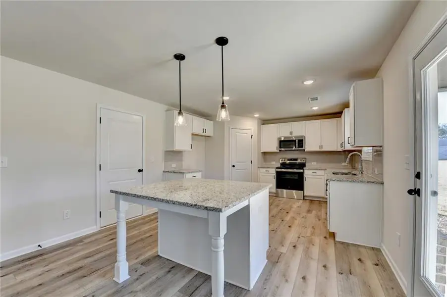 Furnished interior view inside a new home in , Auburn (Image 3).