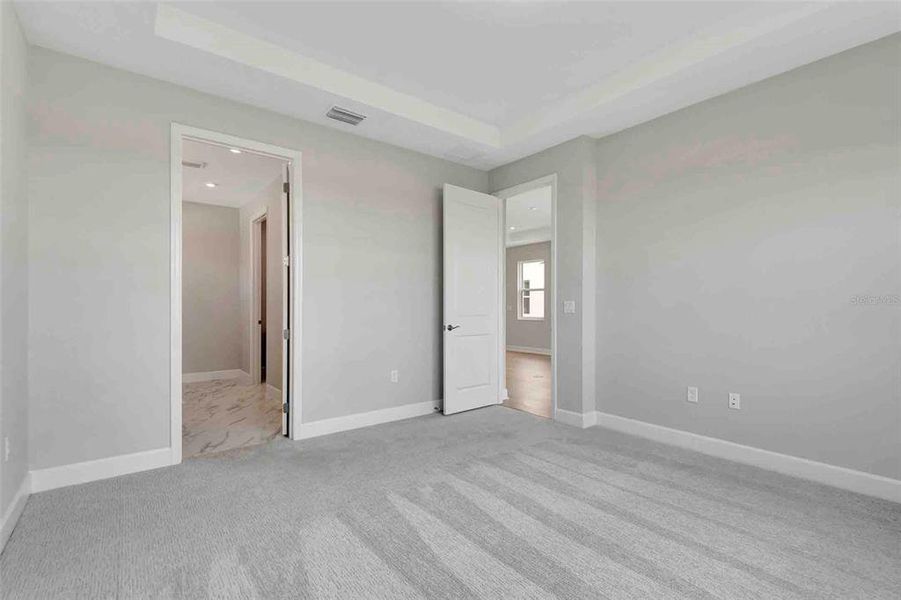 Spacious, unfurnished interior of a new home in Cresswind at Lake Harris, Tavares (Image 40).