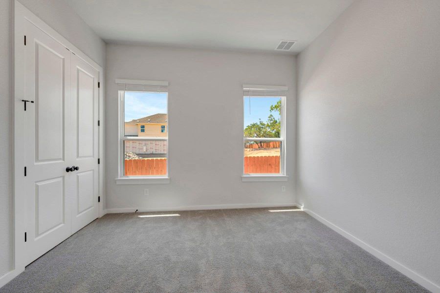 Spacious, unfurnished interior of a new home in Heritage, Dripping Springs (Image 25).