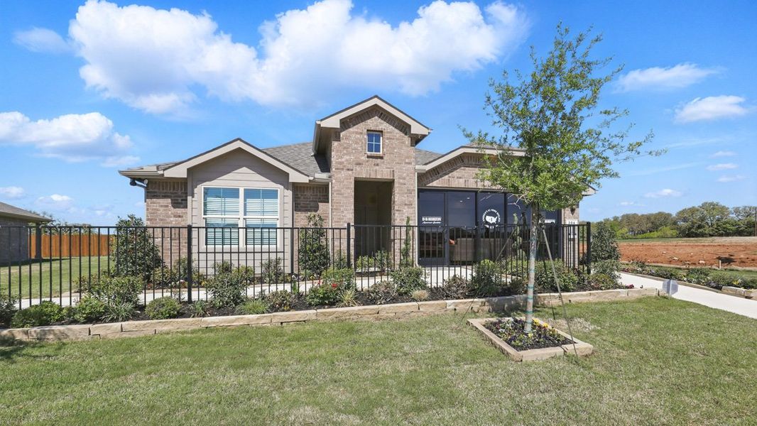 Representative exterior photo of a completed home built from the Plan by D.R. Horton in Eagle Creek, Denton, TX (Image 1). Representative exterior photo of a completed home built from the Plan by D.R. Horton in Eagle Creek, Denton, TX (Image 1).