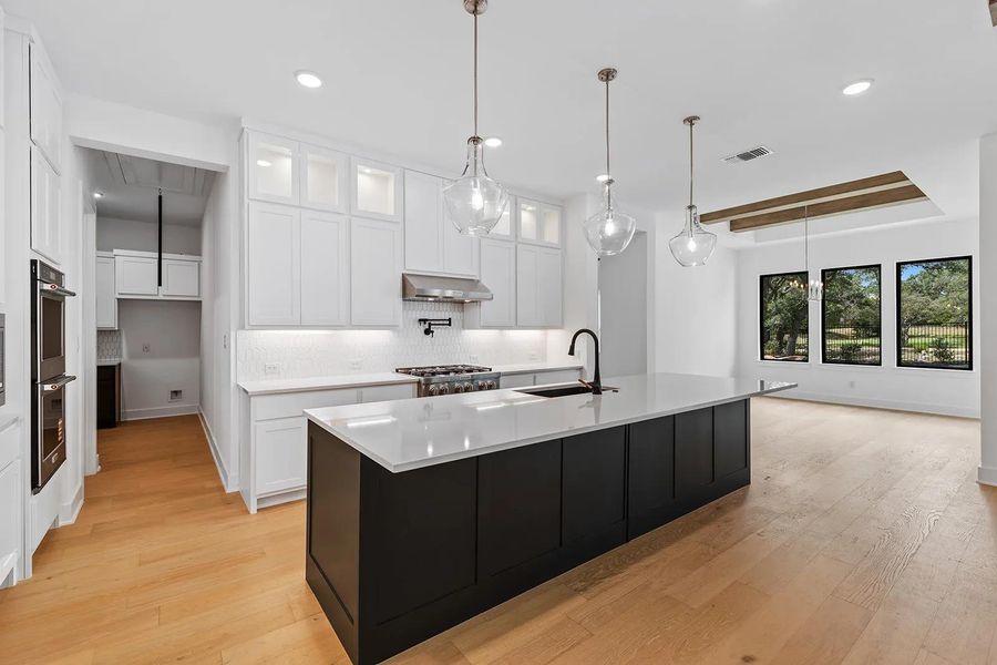Furnished interior view inside a new home in Caliterra - 110', Dripping Springs (Image 12). Furnished interior view inside a new home in Caliterra - 110', Dripping Springs (Image 12).
