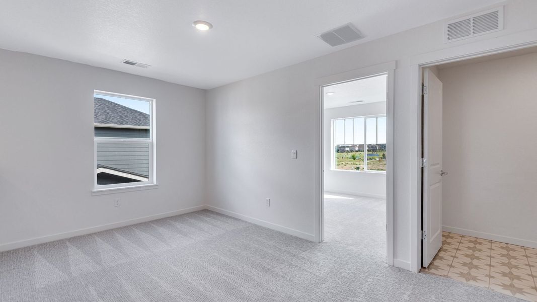 Spacious, unfurnished interior of a new home in Trails at Crowfoot, Parker (Image 19). Spacious, unfurnished interior of a new home in Trails at Crowfoot, Parker (Image 19).