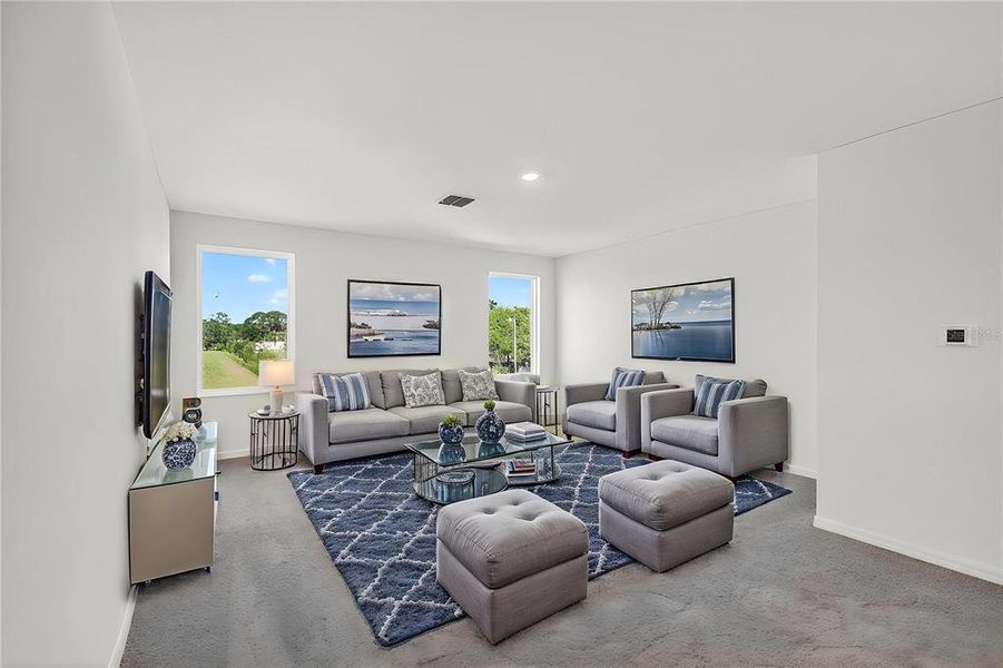 Furnished interior view inside a new home in Tula Parc, Astatula (Image 7).