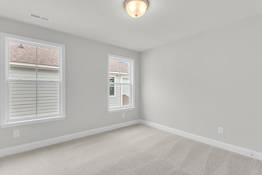 Spacious, unfurnished interior of a new home in Sweetgrass Station, Summerville (Image 29).