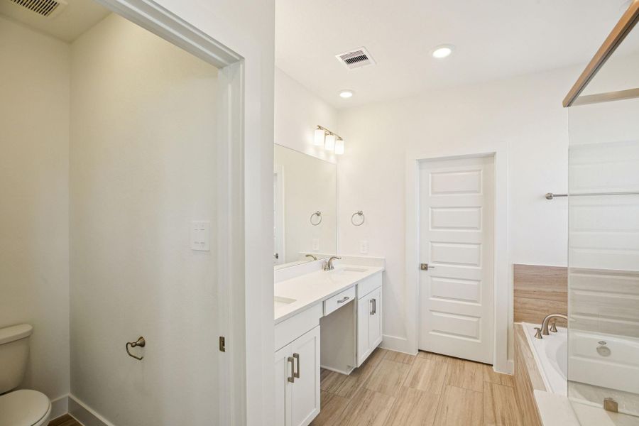 Furnished interior view inside a new home in Pinewood Trails - Luxe Series, Houston (Image 18).