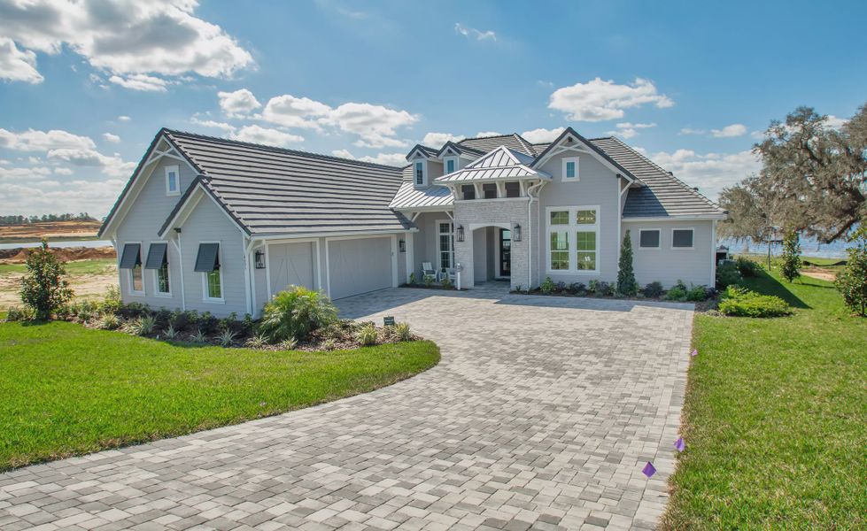 Front exterior of a new home in West Hill Estates, Dade City, FL, highlighting curb appeal (Image 2).
