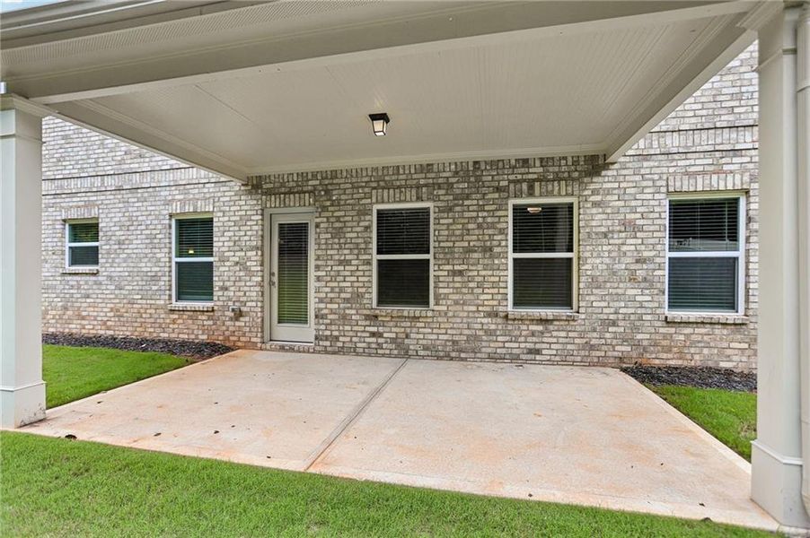 Exterior details and patio area of a home in , McDonough (Image 28).