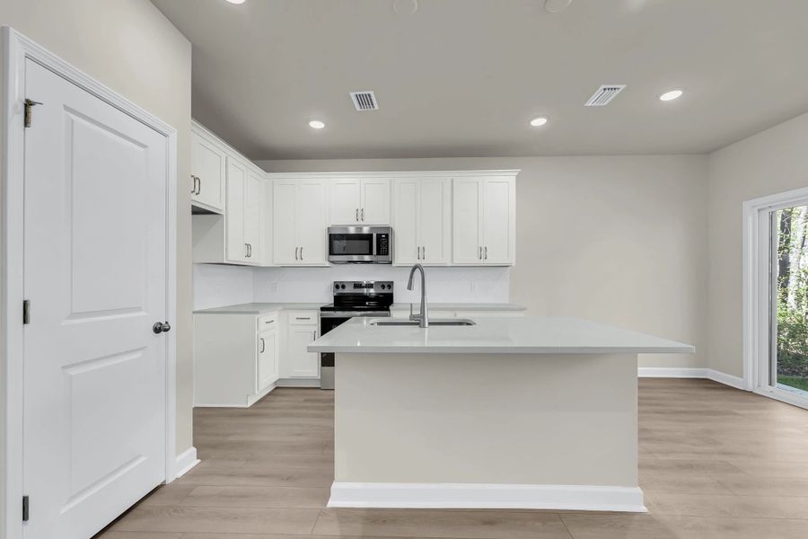 Furnished interior view inside a new home in Windward Village, Summerville (Image 3).