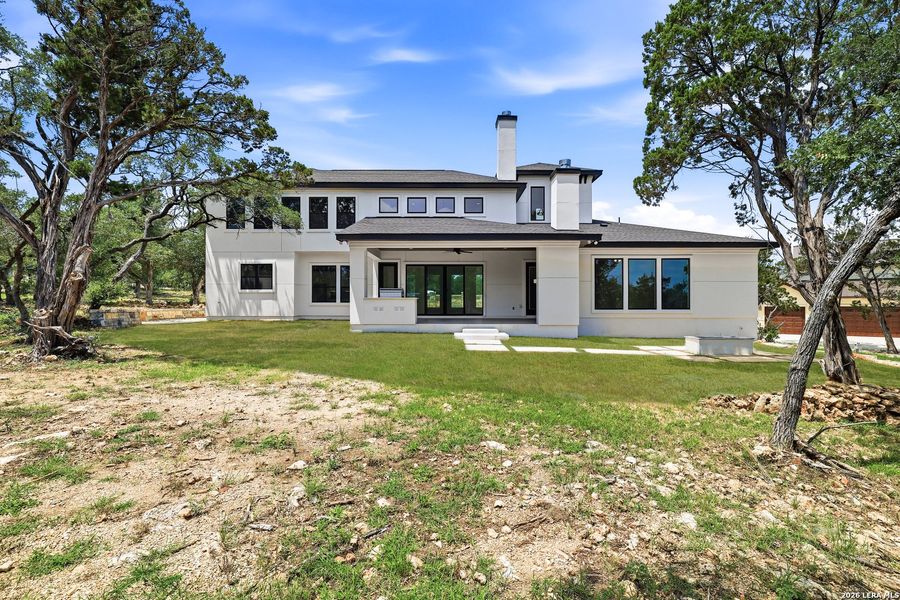 Exterior details and patio area of a home in , New Braunfels (Image 46).