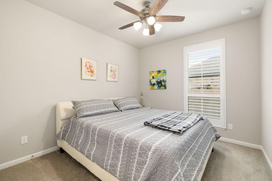 Spacious secondary bedrooms provide flexibility for family, guests, or work-from-home needs.