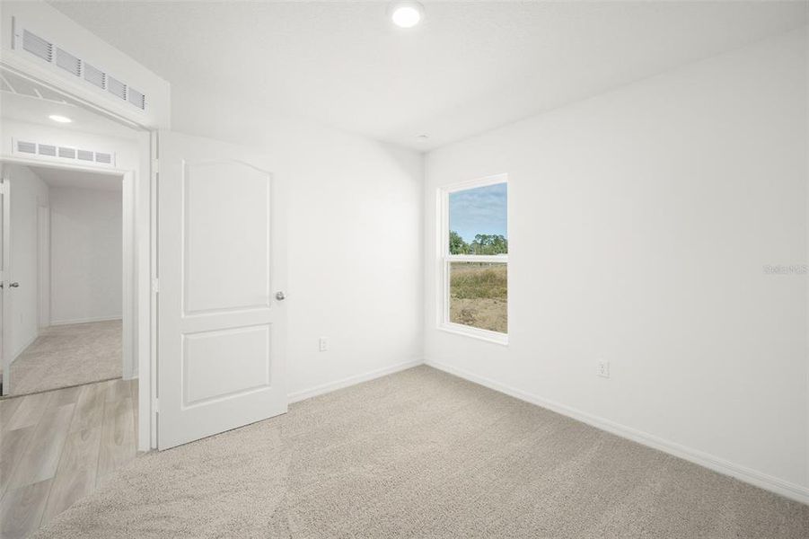 Spacious, unfurnished interior of a new home in Tula Parc, Astatula (Image 13).