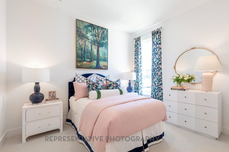 Bedroom with light carpet