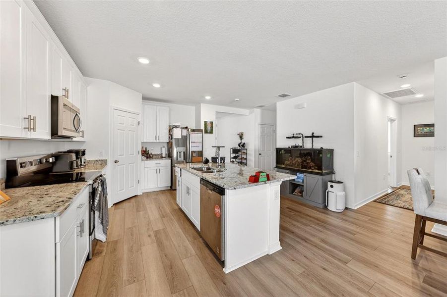 Furnished interior view inside a new home in Deer Run at Crosswinds, Davenport (Image 17).