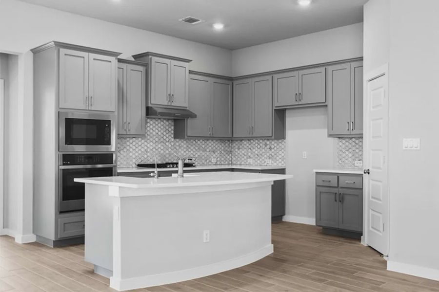 Representative furnished interior of a home built from the Cooper by Chesmar Homes in Carillon, Boerne (Image 3).