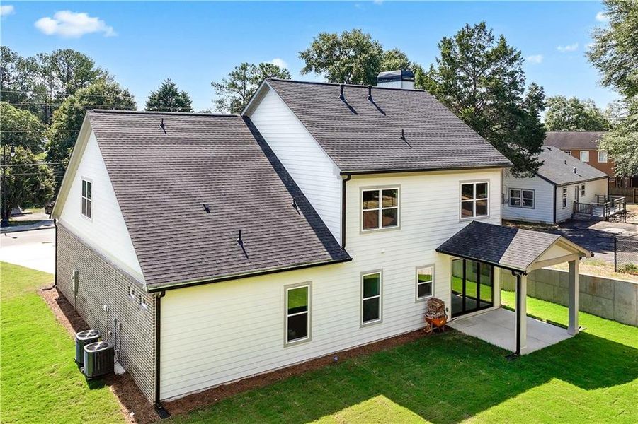 Front exterior of a new home in , Lawrenceville, GA, highlighting curb appeal (Image 30). Front exterior of a new home in , Lawrenceville, GA, highlighting curb appeal (Image 30).
