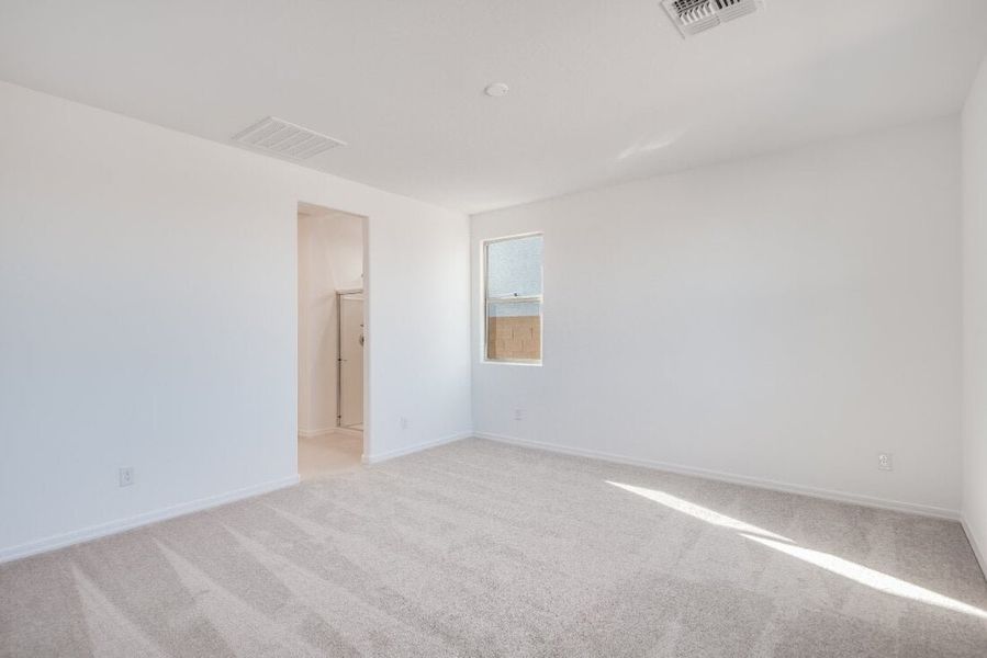 Spacious, unfurnished interior of a new home in Artisan at Asante, Surprise (Image 14).