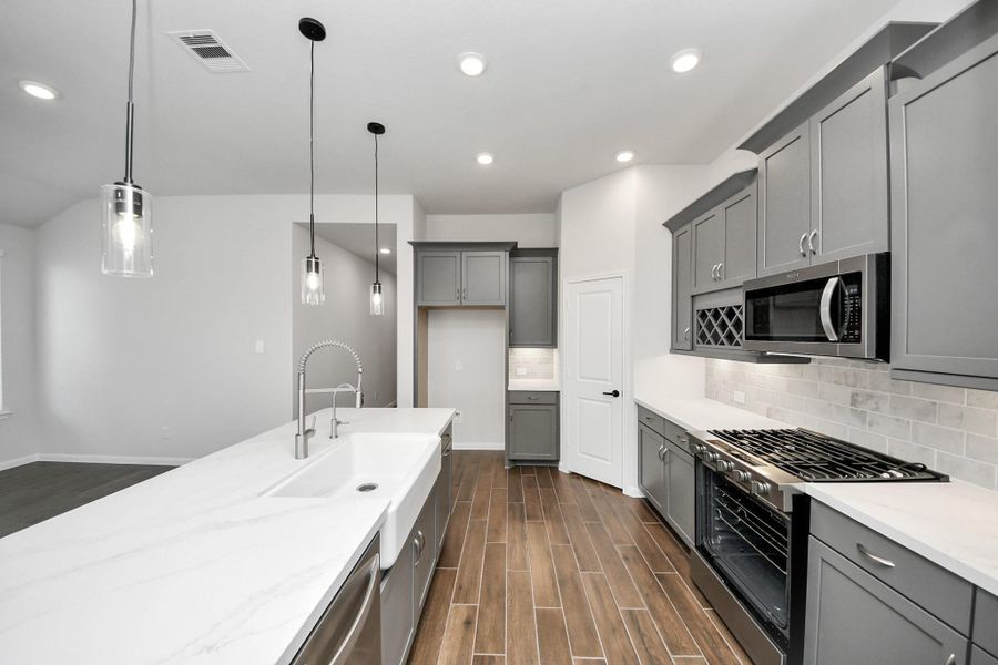 Furnished interior view inside a new home in Arabella on the Prairie: Premier Collection, Richmond (Image 6). Furnished interior view inside a new home in Arabella on the Prairie: Premier Collection, Richmond (Image 6).